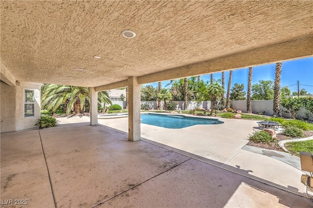 view of pool featuring a fenced backyard, a fenced in pool, and a patio