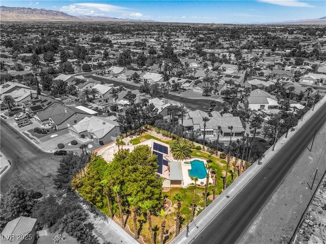 bird's eye view with a residential view and a mountain view