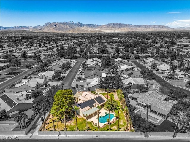 bird's eye view with a residential view and a mountain view