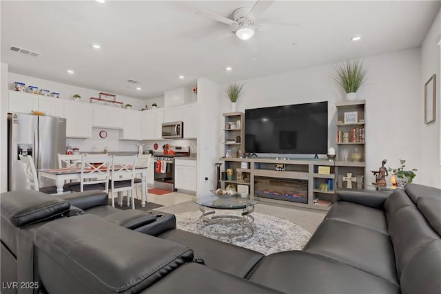 664 Foam Flower Ln, Henderson, NV 89015 - living room featuring a ceiling fan and recessed lighting