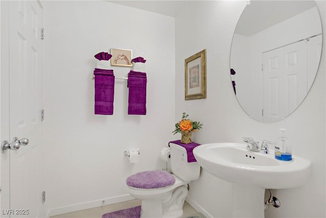 664 Foam Flower Ln, Henderson, NV 89015 - half bathroom with baseboards, toilet, and a sink