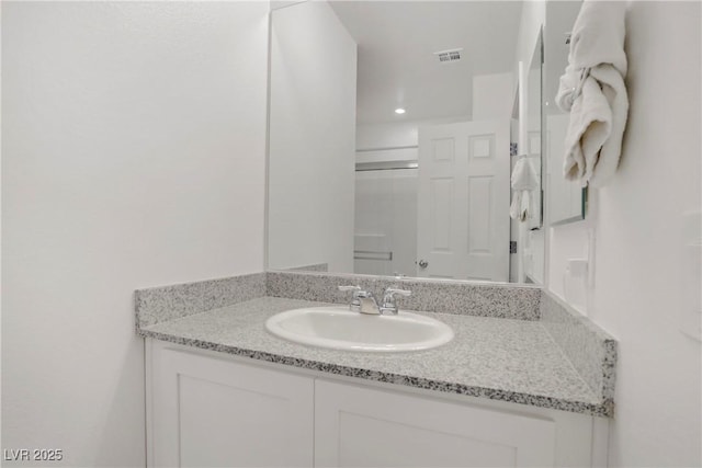 664 Foam Flower Ln, Henderson, NV 89015 - bathroom featuring vanity and recessed lighting