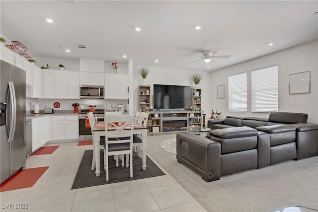 664 Foam Flower Ln, Henderson, NV 89015 - living area with ceiling fan, light tile patterned floors, and recessed lighting