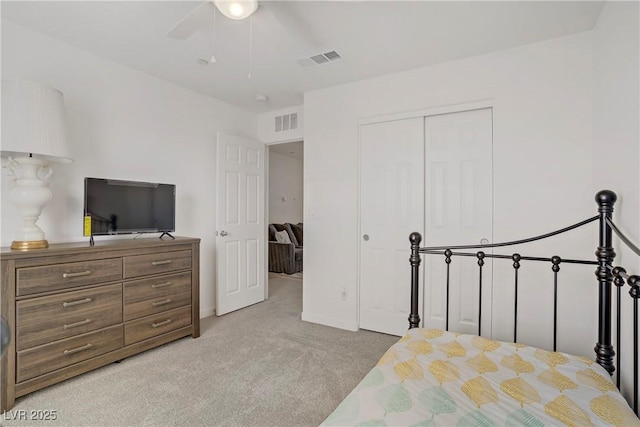 664 Foam Flower Ln, Henderson, NV 89015 - bedroom with carpet floors, a closet, a ceiling fan, and baseboards