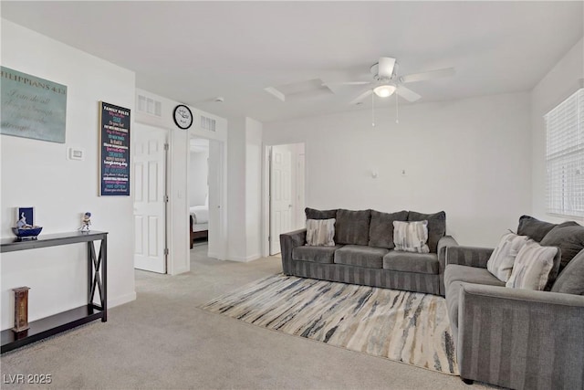 664 Foam Flower Ln, Henderson, NV 89015 - living area with carpet, ceiling fan, and baseboards