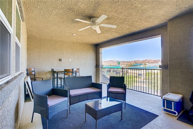 664 Foam Flower Ln, Henderson, NV 89015 - view of patio with a ceiling fan, a balcony, and an outdoor hangout area