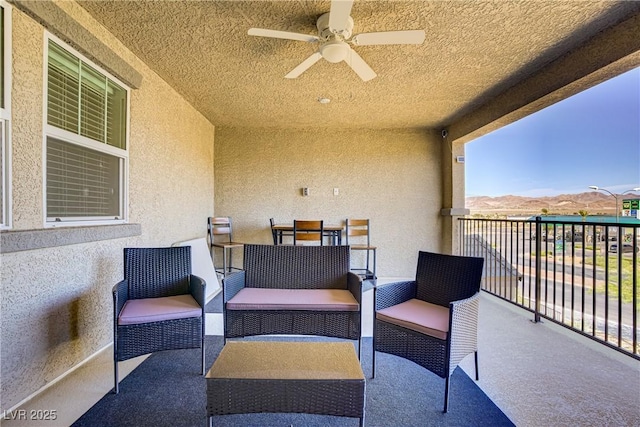 664 Foam Flower Ln, Henderson, NV 89015 - view of patio featuring a balcony, ceiling fan, and an outdoor living space