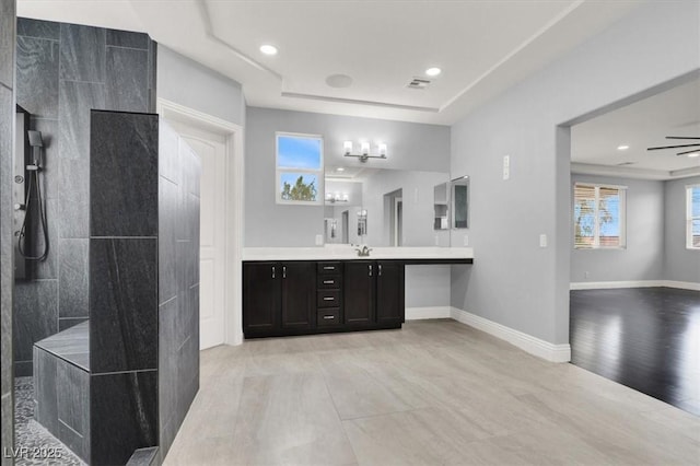 full bath with walk in shower, wood finished floors, visible vents, and vanity