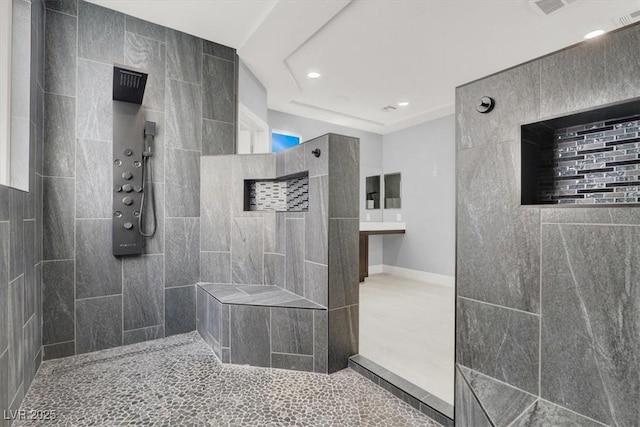 bathroom featuring tile patterned flooring, walk in shower, and recessed lighting