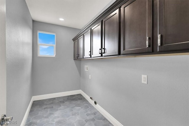 laundry area featuring cabinet space, hookup for a washing machine, recessed lighting, hookup for a gas dryer, and baseboards