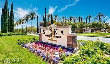 community sign with a lawn