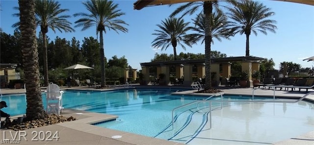 pool featuring a patio area