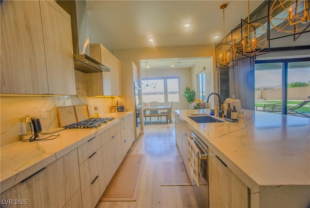 8310 W Camero Ave, Las Vegas, NV 89113 - kitchen with a sink, modern cabinets, wall chimney exhaust hood, and light brown cabinets