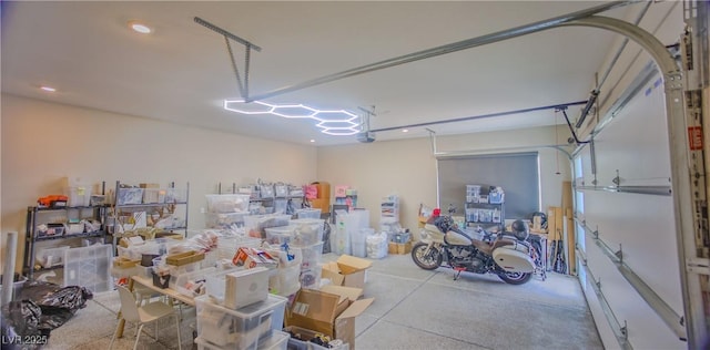 8310 W Camero Ave, Las Vegas, NV 89113 - garage with recessed lighting and a garage door opener