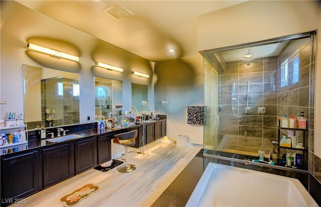 8310 W Camero Ave, Las Vegas, NV 89113 - full bath featuring visible vents, a tile shower, and vanity