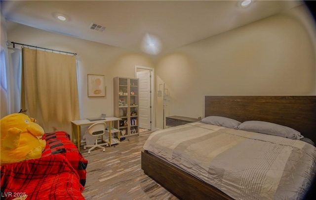 8310 W Camero Ave, Las Vegas, NV 89113 - bedroom with recessed lighting, wood finished floors, and visible vents