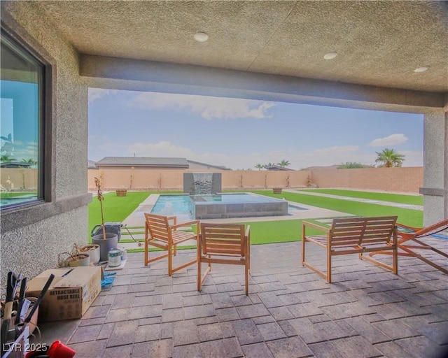 8310 W Camero Ave, Las Vegas, NV 89113 - view of patio featuring a fenced in pool and a fenced backyard