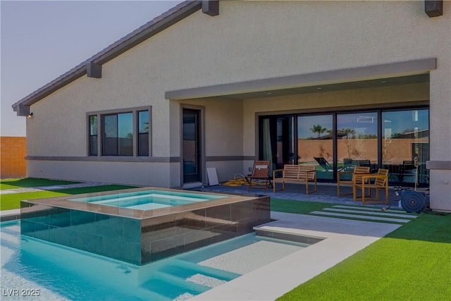 8310 W Camero Ave, Las Vegas, NV 89113 - rear view of property featuring a patio, an in ground hot tub, an outdoor pool, and stucco siding