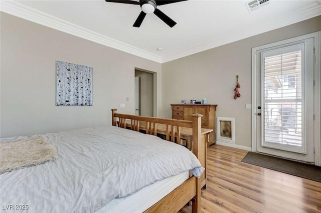9243 White Waterfall Ave, Las Vegas, NV 89149 - bedroom featuring crown molding, light wood-style floors, access to exterior, a ceiling fan, and baseboards