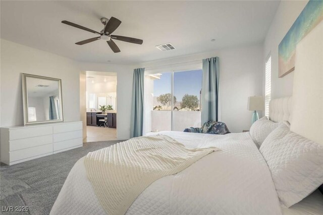 bedroom featuring visible vents, a ceiling fan, and carpet