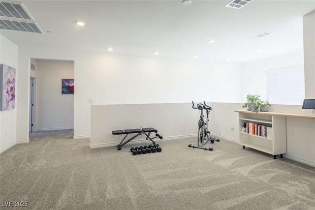 exercise room featuring carpet floors, recessed lighting, baseboards, and visible vents