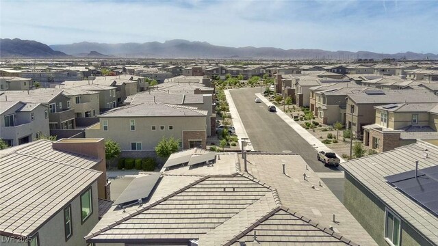 drone / aerial view with a mountain view and a residential view