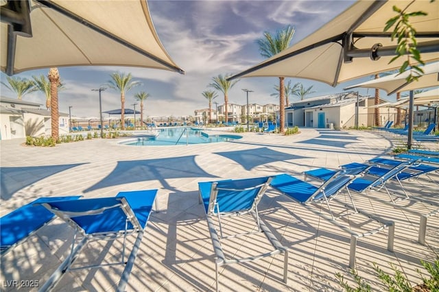 pool with a patio area