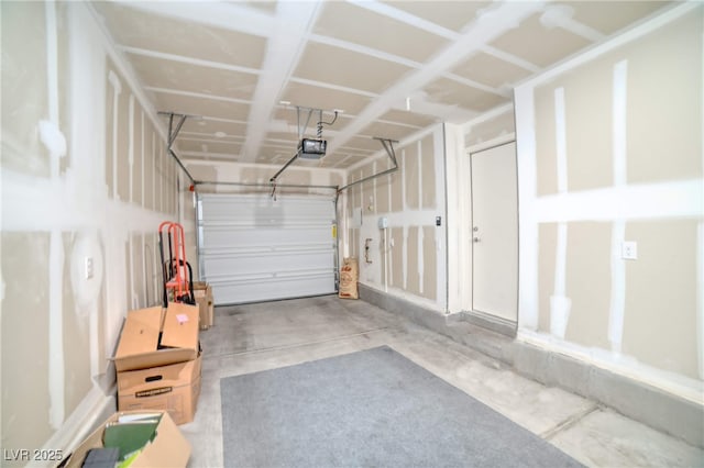 garage featuring a garage door opener