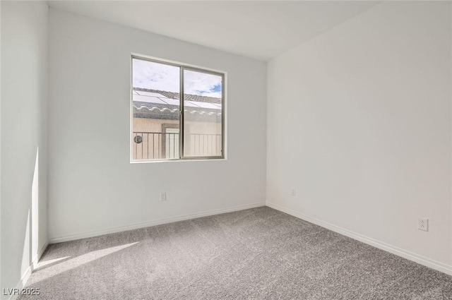 58 Sun Lily Ln, Henderson, NV 89011 - carpeted empty room with baseboards