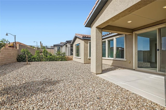 58 Sun Lily Ln, Henderson, NV 89011 - view of yard with fence and a patio area