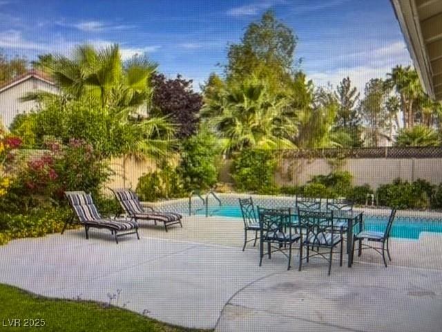 390 Rushing Creek Ct, Henderson, NV 89014 - view of swimming pool featuring a fenced backyard and a patio