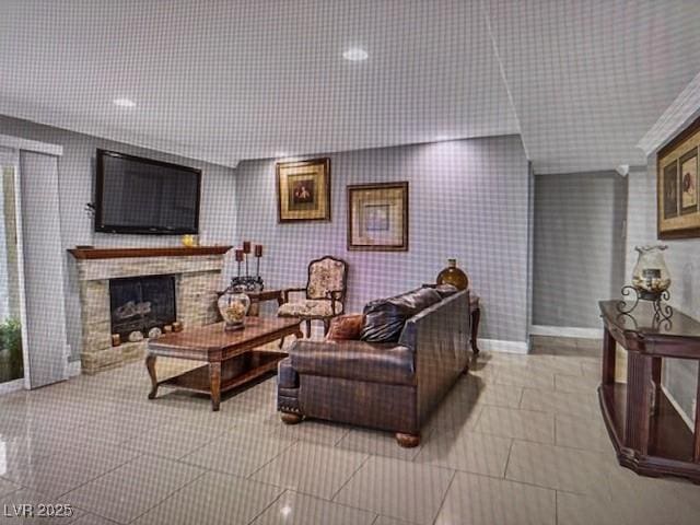 390 Rushing Creek Ct, Henderson, NV 89014 - living area featuring baseboards and a fireplace