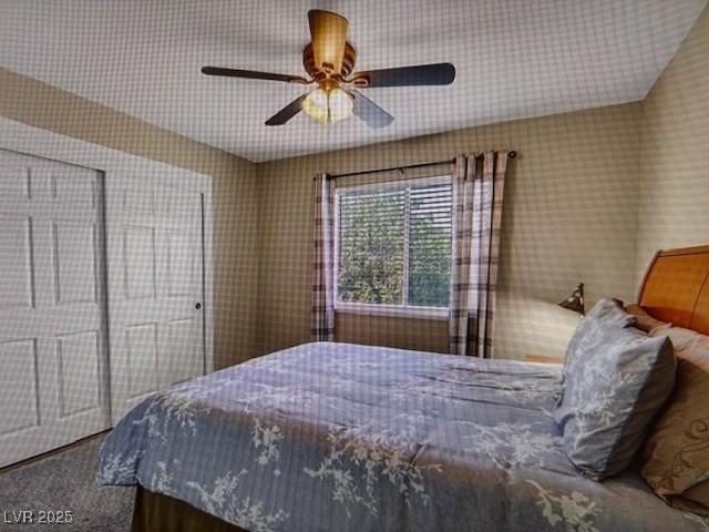 390 Rushing Creek Ct, Henderson, NV 89014 - carpeted bedroom featuring ceiling fan and wallpapered walls
