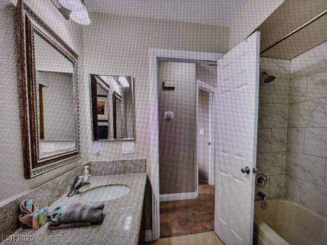 390 Rushing Creek Ct, Henderson, NV 89014 - full bath featuring bathing tub / shower combination, vanity, and wood finished floors