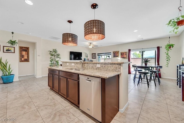 5226 Lignum Ave Unit 1, Pahrump, NV 89061 - kitchen featuring ceiling fan, decorative light fixtures, stainless steel dishwasher, a sink, and open floor plan