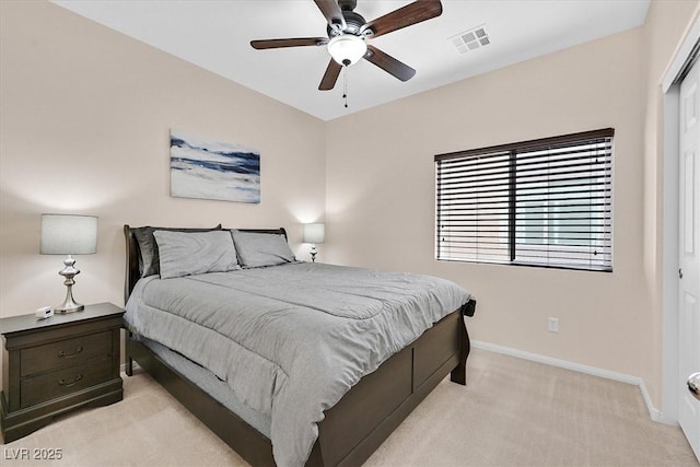 5226 Lignum Ave Unit 1, Pahrump, NV 89061 - bedroom featuring baseboards, a ceiling fan, light colored carpet, and visible vents