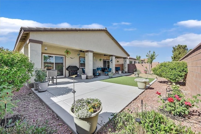 5226 Lignum Ave Unit 1, Pahrump, NV 89061 - rear view of property with a fenced backyard, ceiling fan, a patio area, and stucco siding