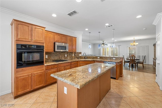 2164 Sawtooth Mountain Dr, Henderson, NV 89044 - kitchen with visible vents, a peninsula, a kitchen island, tasteful backsplash, and stainless steel appliances