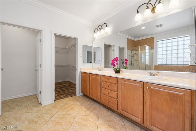 2164 Sawtooth Mountain Dr, Henderson, NV 89044 - bathroom with double vanity, a sink, a stall shower, and ornamental molding