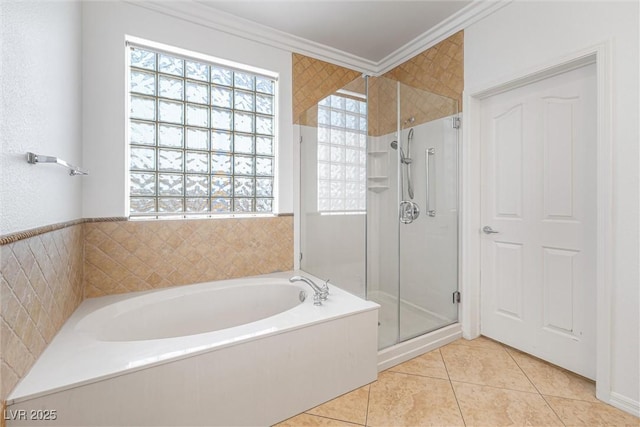 2164 Sawtooth Mountain Dr, Henderson, NV 89044 - full bathroom featuring a bath, tile patterned floors, a wealth of natural light, and a shower stall