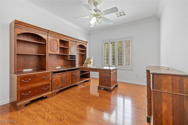2164 Sawtooth Mountain Dr, Henderson, NV 89044 - office space featuring a ceiling fan, visible vents, ornamental molding, and light wood finished floors