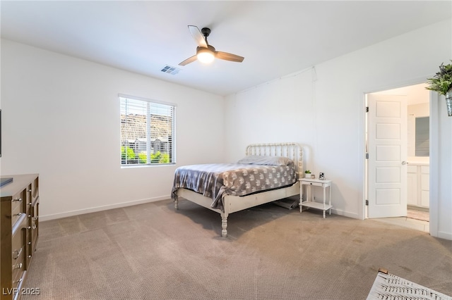 23 Strada Barbera, Henderson, NV 89011 - bedroom with light carpet, baseboards, and ceiling fan