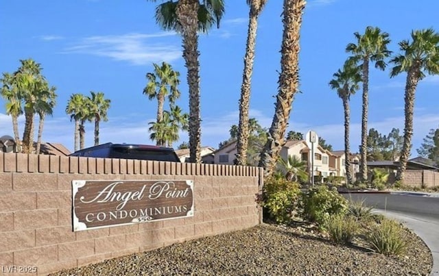 community sign with a residential view