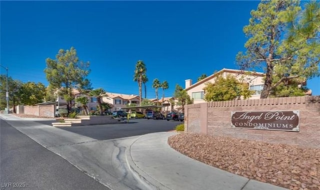 view of street featuring a residential view and sidewalks