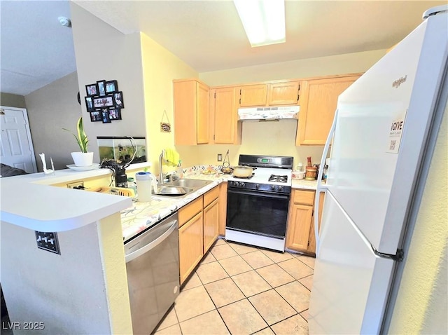 350 S Durango Dr Unit 220, Las Vegas, NV 89145 - kitchen with gas stove, under cabinet range hood, light brown cabinets, stainless steel dishwasher, and freestanding refrigerator