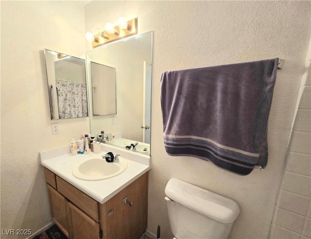 350 S Durango Dr Unit 220, Las Vegas, NV 89145 - bathroom with vanity and toilet