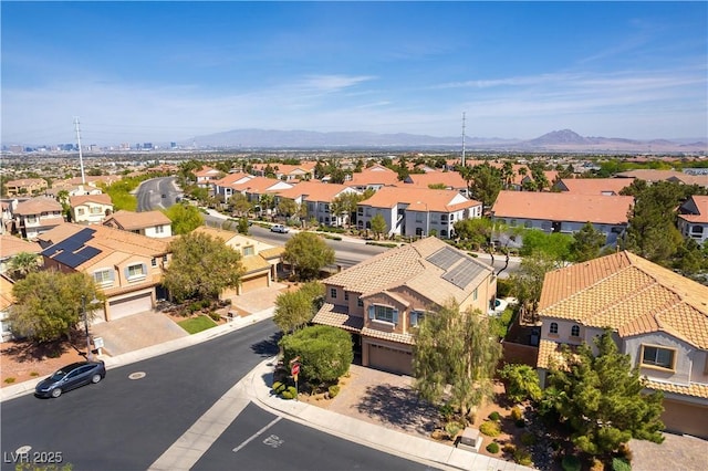 bird's eye view with a residential view and a mountain view