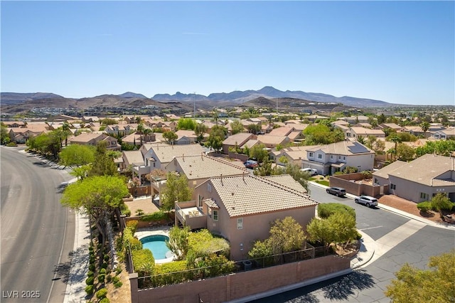 birds eye view of property featuring a residential view and a mountain view