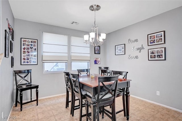 722 Chepstow Ave, Las Vegas, NV 89178 - dining room with light tile patterned floors, baseboards, visible vents, and an inviting chandelier