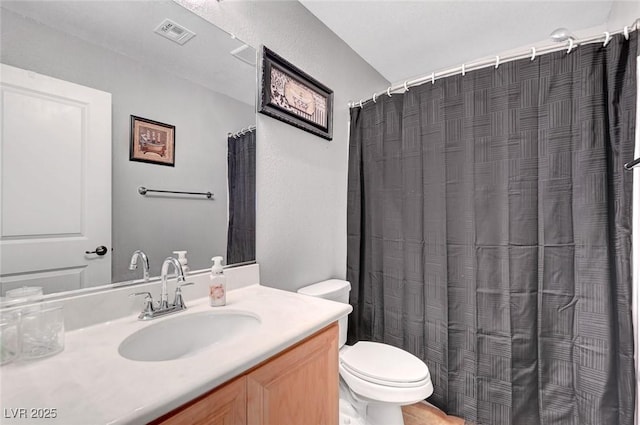 722 Chepstow Ave, Las Vegas, NV 89178 - full bath with toilet, a shower with curtain, visible vents, and vanity